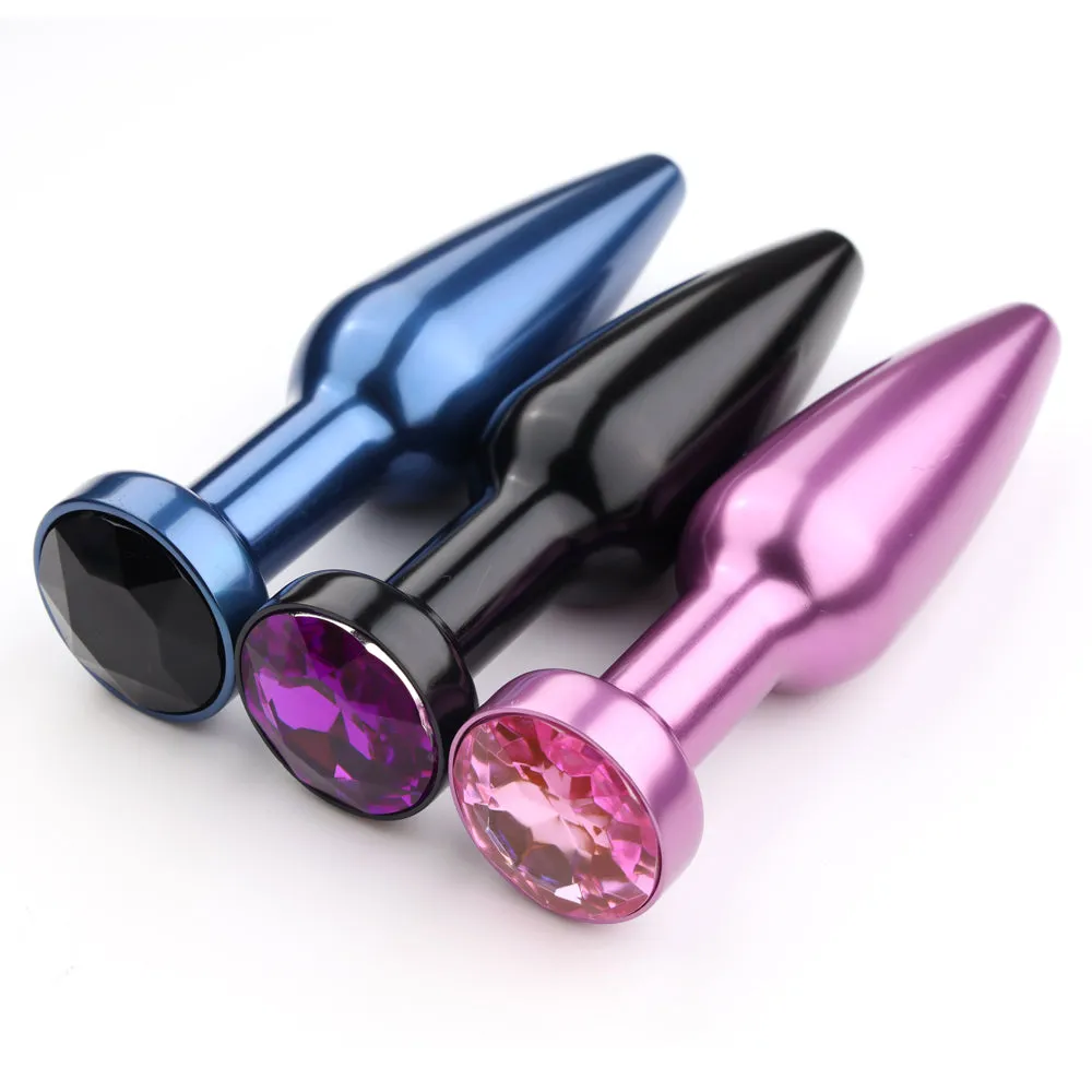 Elongated Tapered Metal Butt Plug With Round Gem